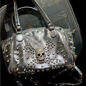 Used studded skull purse